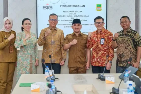 SIG dan Pemkab Bekasi menandatangani kesepakatan bersama percepatan pembangunan berkelanjutan melalui infrastruktur, inovasi, dan SDM unggul.
